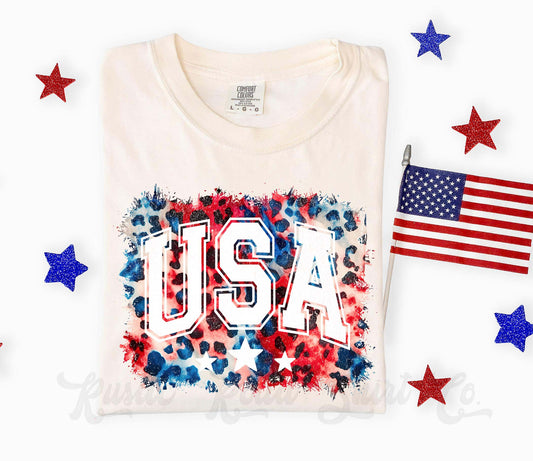 White t-shirt with 'USA' design and American flag on a white background